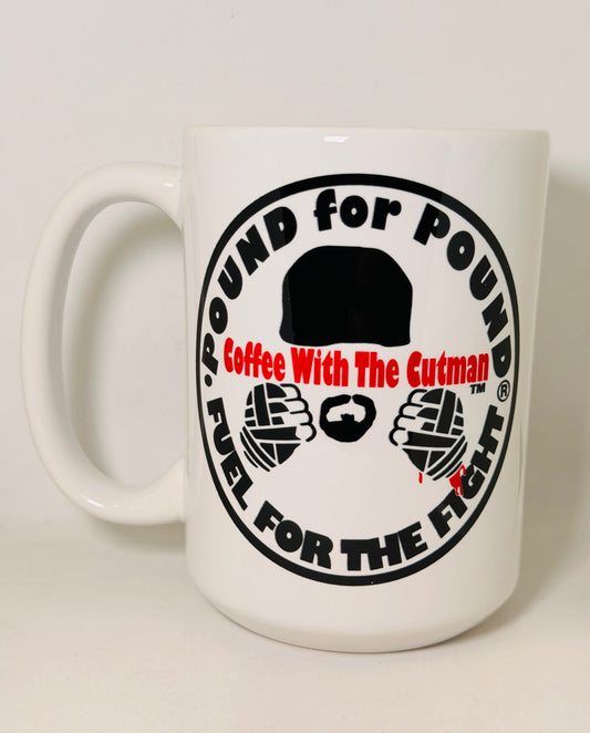 A white ceramic coffee mug featuring a circular black and red graphic design with the text 'POUND FOR POUND Coffee With The Cutman FUEL FOR THE FIGHT' and illustrations of a hat, beard, and fists.